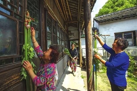 端午节吃粽子都是为了纪念屈原？这个大城市可不这么认为！